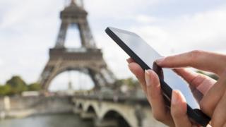 Technology Eiffel tower and mobile phone