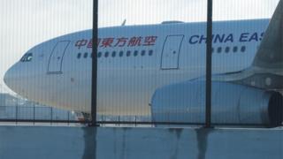 A China Eastern Airlines Airbus A330 aircraft sits on the tarmac at Sydney International Airport in Australia