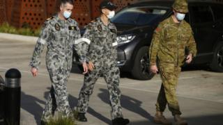 Military staff are seen at Epping Gardens Aged Care Facility in Epping, outskirts of Melbourne, Australia