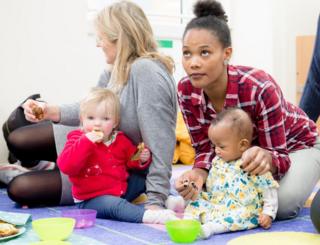 Parents and babies at a healthy eating class in London