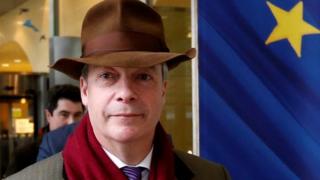 Nigel Farage leaves a meeting at the EU Commission headquarters in Brussels