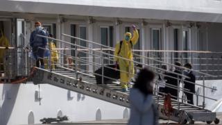 Crew members disembarking