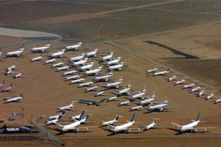 Jumbo jets, DC 10's, Lockheed Tri Stars, DC 9's. Boeing 727 and 737's are among the planes in storage at the Mojave airport where more than 200 commercial jets sit with engines and windows taped , the result of the drop in air travel since the New York World Trade Center attack September 11, 2001