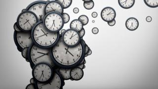 Forma de cabeza humana hecha con relojes