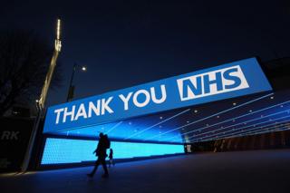 A sign by Wembley Park Tube Station in London that thanks the hardworking NHS staff