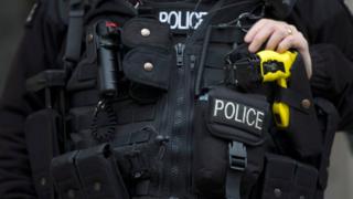 Armed police officer in London