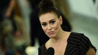 Alyssa Milano addressing reporters