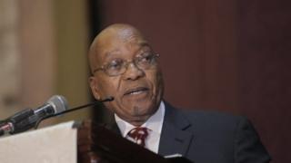 South African President Jacob Zuma speaks to delegates at the Harare International Conference Centre in Harare
