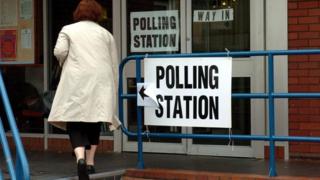 Women arriving at a polling station