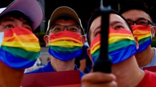 Members of the LGBT community join a march to celebrate the pride month at the National Chiang Kai-shek Memorial Hall in Taipei, Taiwan, 28 June 2020