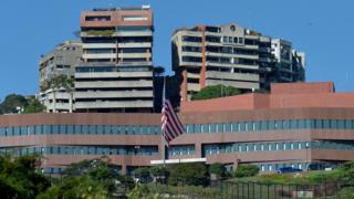 Image shows the entrance of the embassy of the United States in Caracas