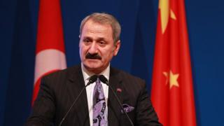 Turkey's Economy Minister Mehmet Zafer Caglayan speaks during the Turkey-China Business Forum