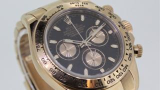 Часы Daytona из черного и розового золота с золотым ремешком