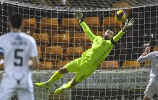 Liam Kelly makes a save