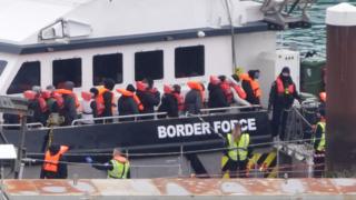 Migrants being brought ashore in Dover