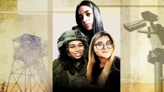 Three women in military gear