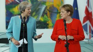 Theresa May and Angela Merkel