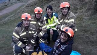 Yasmin Khan (centre) with her rescuers from West Midlands Ambulance Service and Hereford and Worcester Fire and Rescue Service