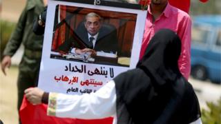 احدى اللوحات في تشييع جنازة النائب العام بركات
