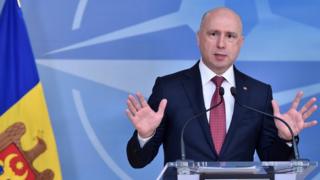 Moldova's Prime Minister Pavel Filip gives a joint statement with Nato Secretary General Jens Stoltenberg after a meeting at NATO Headquarters in Brussels