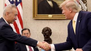 U.S. President Donald Trump shakes hands with Chinese Vice Premier Liu He