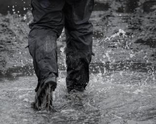 A person walking through water