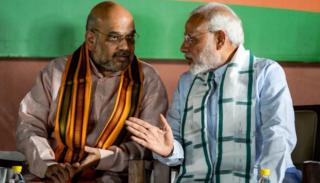 નરેન્દ્ર મોદી અને અમિત શાહની તસવીર