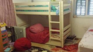Photo released by Israeli military showing bedroom of Israeli girl stabbed to death at settlement of Kiryat Arba, in the West Bank (30 June 2016)