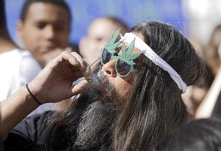   Participant at the celebration on the occasion of the legalization of cannabis for medical purposes in the US state of Colorado 