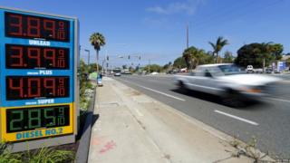 The current price of gasoline is shown on a gas station sign in Encinitas, California on 4 August 2015