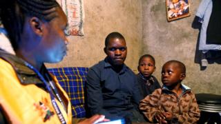 Census worker with family