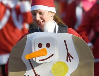 Woman dressed as Santa