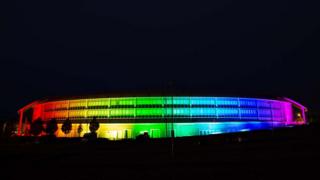 A rainbow of coloured light projected onto the main GCHQ building
