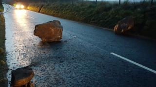 Rocks from Binevenagh Mountain have landed on the road