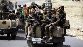 Afghan Army soldiers secure the area in Koh district of Nangarhar province,