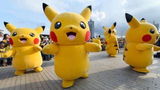 Dozens of people dressed up as Pikachu, the famous character of Nintendo's videogame software Pokemon
