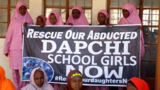 Schoolgirls wait for the arrival of Nigeria"s President Muhammadu Buhari at the Goverment girls" science and technical college in Dapchi, Nigeria March 14, 2018