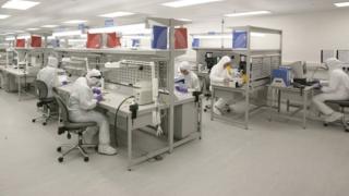 Vascutek staff working in cleanroom