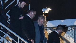 Lula chegando à PF em Curitiba