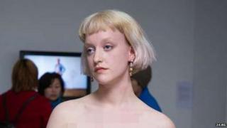 Head and shoulders of naked woman