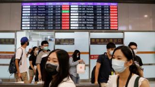 A departure board at Taiwan's Songshan Airport