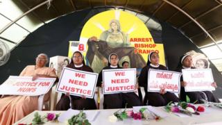 Nuns hold placards during a protest demanding justice after an alleged sexual assault of a nun by a bishop, on September 15, 2018 in Kochi, Kerala