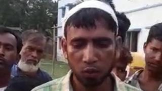 সাংবাদিকদের সাথে কথা বলছেন আক্রান্ত মুসলিমদের একজন