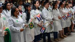 Cuban doctors at the welcoming ceremony at Havana airport after their return from Brazil - November 23