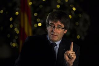 Carles Puigdemont speaks during an interview with The Associated Press in Barcelona, Spain, 16 December