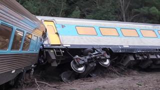 The derailed carriages of a passenger train that was travelling from Sydney to Melbourne, Australia