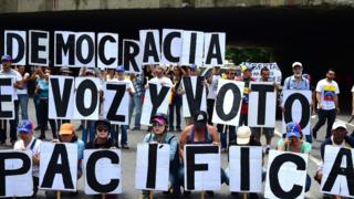 Opposition activists protest in Caracas