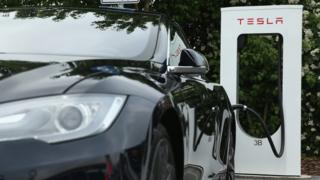 Tesla car at a charging station