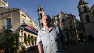 Eusebio Leal walks at the Cathedral square, May 5, 2004, in Havana, Cuba