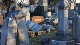 toppled gravestones